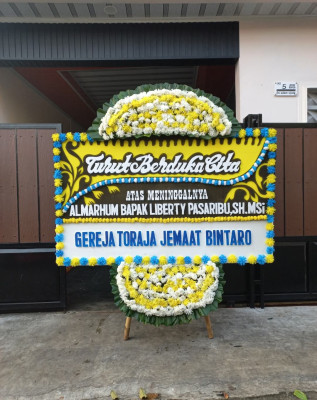 Papan Bunga Duka di Petuk Barunai